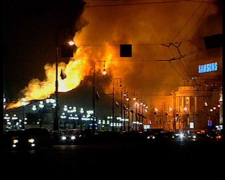 Flames of burning Manezh exhibition center near Moscow's Kremlin. Fire, Moscow architecture