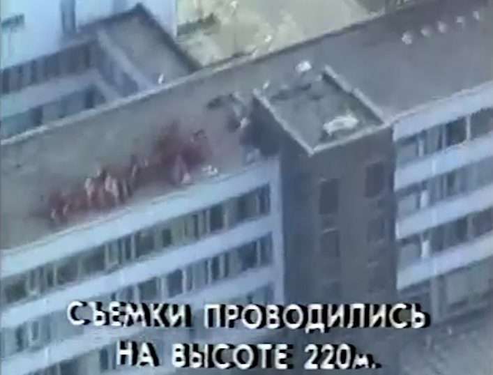Helicopter flying over wrecked burning carcass reactor exploded nuclear Chernobyl power plant stock video footage